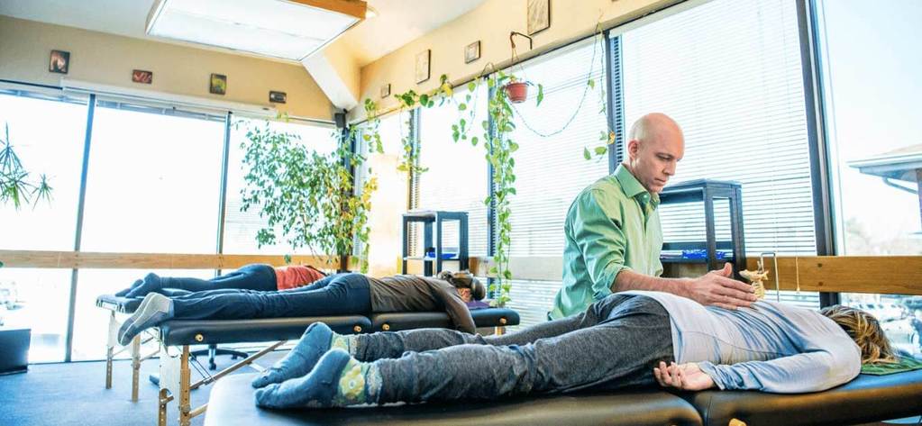 Dr. Jay offering his form of energy work, BioSoul Integration