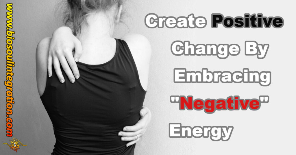 woman embracing herself, representing embracing negative energy