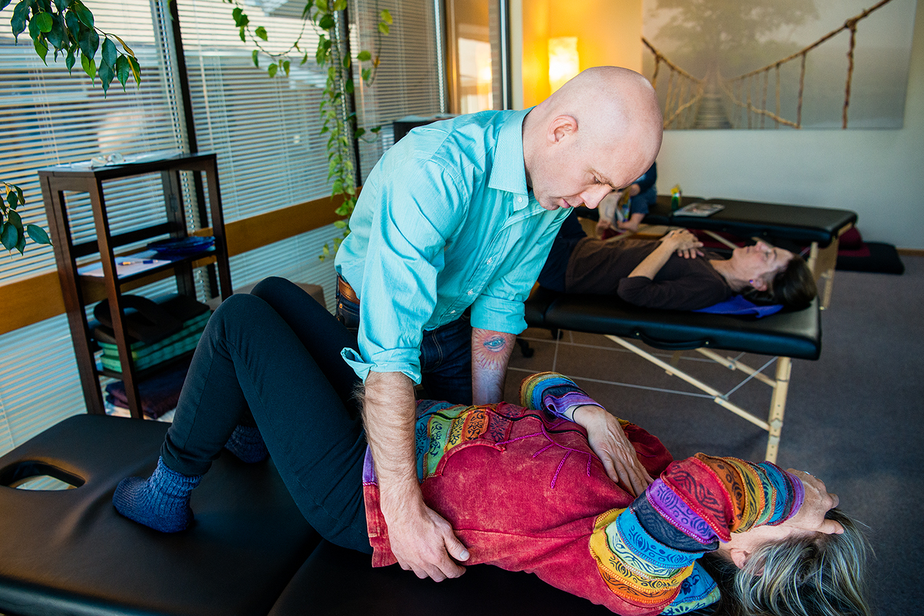 Dr. Jay performing BioSoul Integration on a client