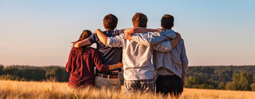 A group of friends hugging each other
