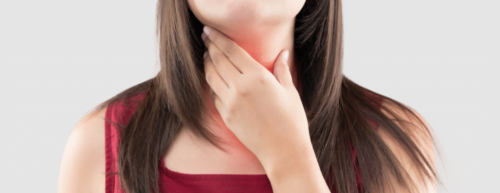 Woman suffering from neck pain